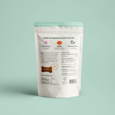 "Minimalist product shot of Flower Power dog treats with soft pastel background, emphasizing the natural and clean label ingredients."