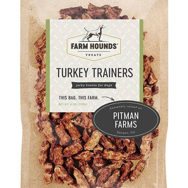A bag of 100% dehydrated turkey dog treats with an easy-break shape, highlighting their high-protein, all-natural ingredients sourced from American family farms.