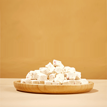 A bowl of strawberry yogurts chews