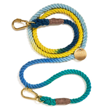 A fully extended Found My Animal azure cotton rope dog leash, highlighting its adjustable design, solid brass bolt snaps, and hand-spliced craftsmanship.
