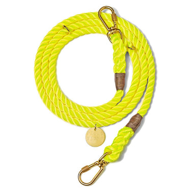 "Neon Yellow Rope Dog Leash by Found My Animal, handcrafted from marine-grade rope with adjustable solid brass bolt snaps for strength and security."

