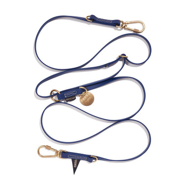 Navy 7ft water-resistant dog leash by Found My Animal, featuring rubber-coated webbing, brass lockable carabiners, and an adjustable design for hands-free and multi-dog walking. Supports pet rescue and adoption.







