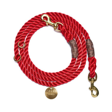 Red Rope Dog Leash by Found My Animal, featuring solid brass bolt snaps, marine-grade rope construction, and an adjustable design to support pet rescue and adoption awareness.








