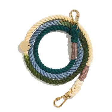 The Catskill Ombre Cotton Rope Dog Leash, featuring a hand-dyed gradient, solid brass lockable carabiner, and adjustable O-rings—crafted for durability, pet wellness, and rescue awareness.