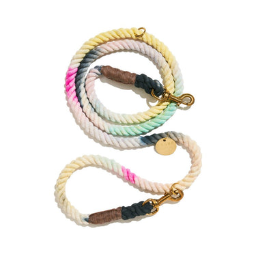 The Dusk Cotton Rope Dog Leash, featuring a hand-dyed ombre design, Italian solid bronze bolt snaps, and adjustable O-rings—crafted for durability, pet wellness, and rescue awareness.